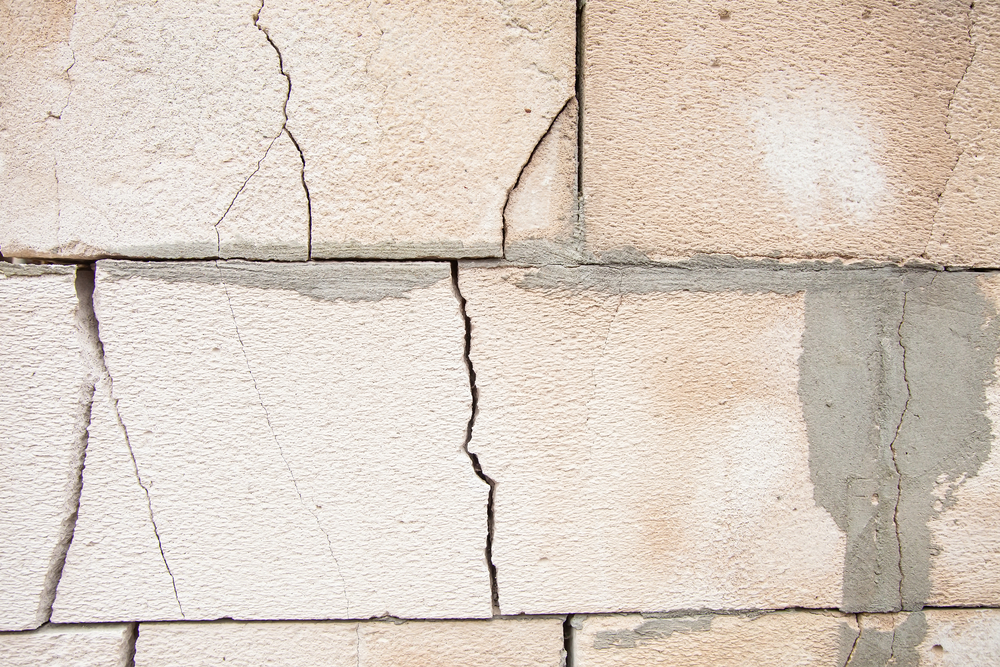 Cracked basement cinderblock wall